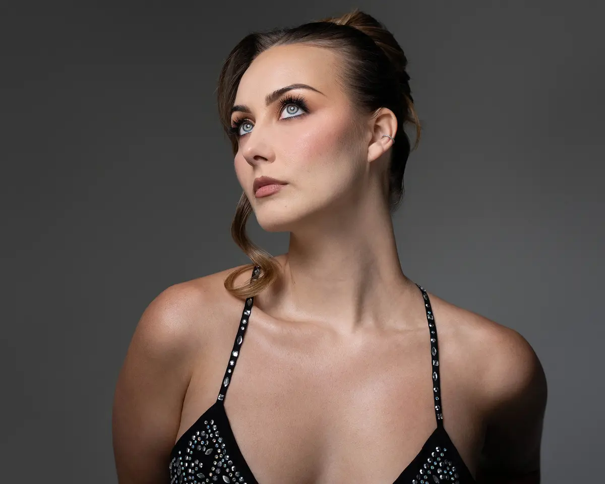 Full-length fashion photography with colored gel lighting in Orlando, Florida by Pottinger Studios