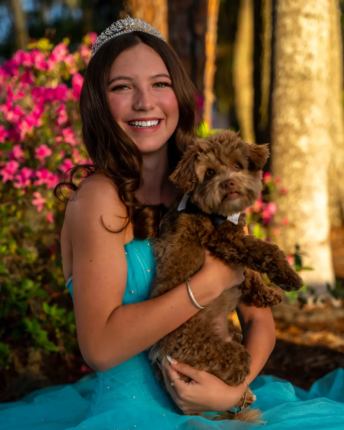 Quinceañera portrait with her puppy at golden hour in Central Florida by Pottinger Studios